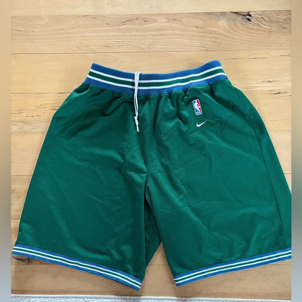 Vintage Nike MN 95 
Timberwolves Green Athletic Shorts with Blue Trim